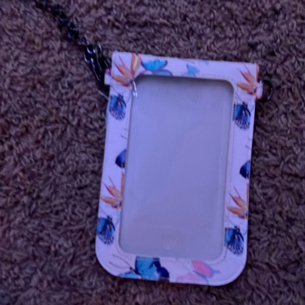 I’m selling a cute phone bag with pockets for cards